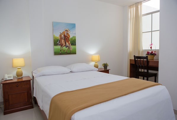 Hypoallergeen beddengoed, een minibar, een bureau, gratis wifi