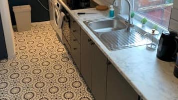 Fridge, microwave, oven, cookware/dishes/utensils