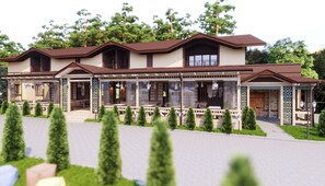 A modern two-story house with a covered porch, multiple windows, and a well-maintained garden.