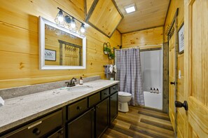 Bathtub, hair dryer, towels, soap