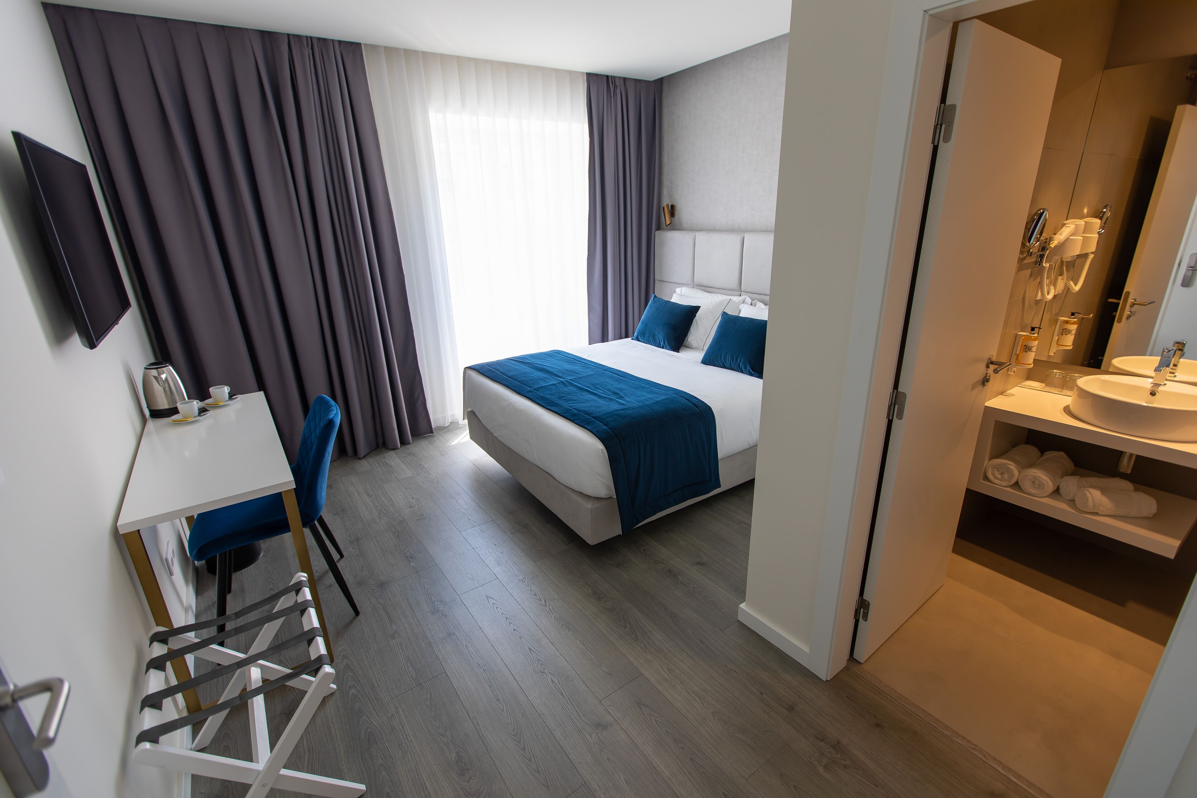 deluxe double room | egyptian cotton sheets, premium bedding, memory-foam beds, minibar