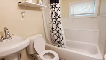 Combined shower/bathtub, hair dryer, towels, soap