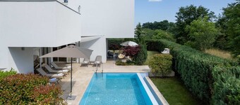 Modern Villa with Heated Indoor and Outdoor Pool for up to 8 Guests