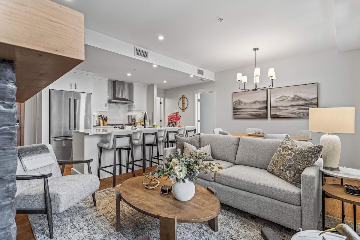 TM304 Two Bedroom Premier Condo | Living area | 50-inch Smart TV with cable channels, TV, fireplace