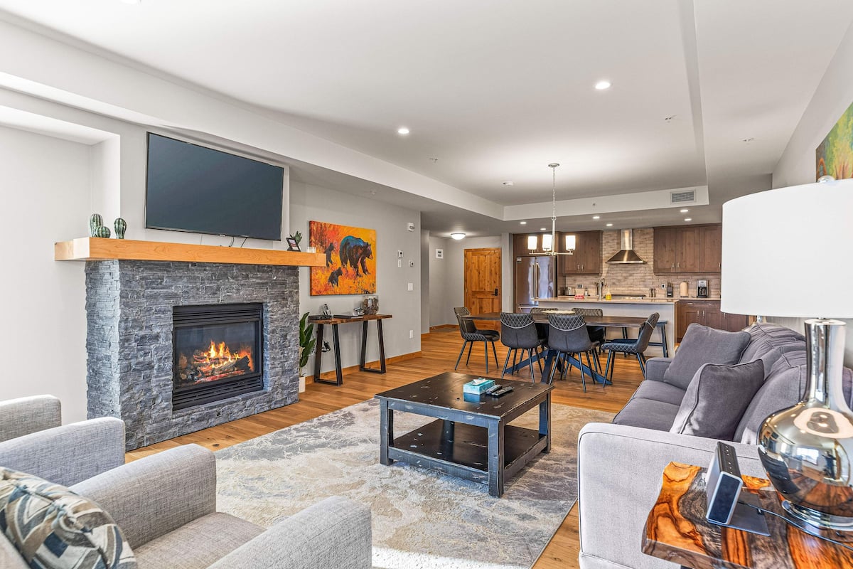 W301 Two Bedroom Premier Condo | Living area | 50-inch Smart TV with cable channels, TV, fireplace