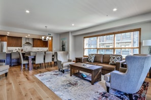 W304 Three Bedroom Premier Condo | Living area | 50-inch Smart TV with cable channels, TV, fireplace