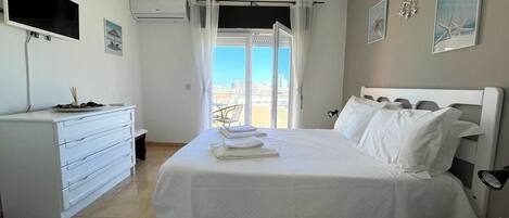 1 غرفة نوم ومكواة/لوح كي وواي فاي وملاءات أسرّة