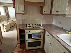 Apartment | Private kitchen | Fridge, microwave, oven, stovetop