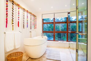Bathtub, jetted bath, hair dryer, towels