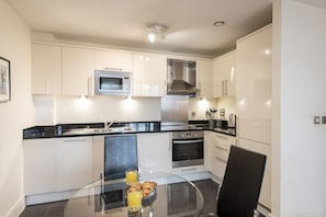 Apartment | Private kitchen | Fridge, microwave, oven, stovetop