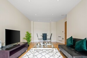 Apartment | Living room | 30-inch TV with digital channels