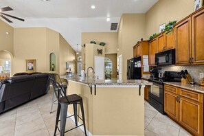 Coffee/tea maker, fridge, microwave, oven