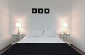 Deluxe Double Room, 1 Queen Bed | Premium bedding, in-room safe, desk, blackout drapes - PH 19 Guesthouse Hotel in Gazcue  (Santo Domingo)