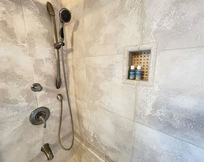 Combined shower/tub, hair dryer, towels, soap