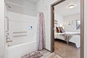 Bathtub, hair dryer, towels