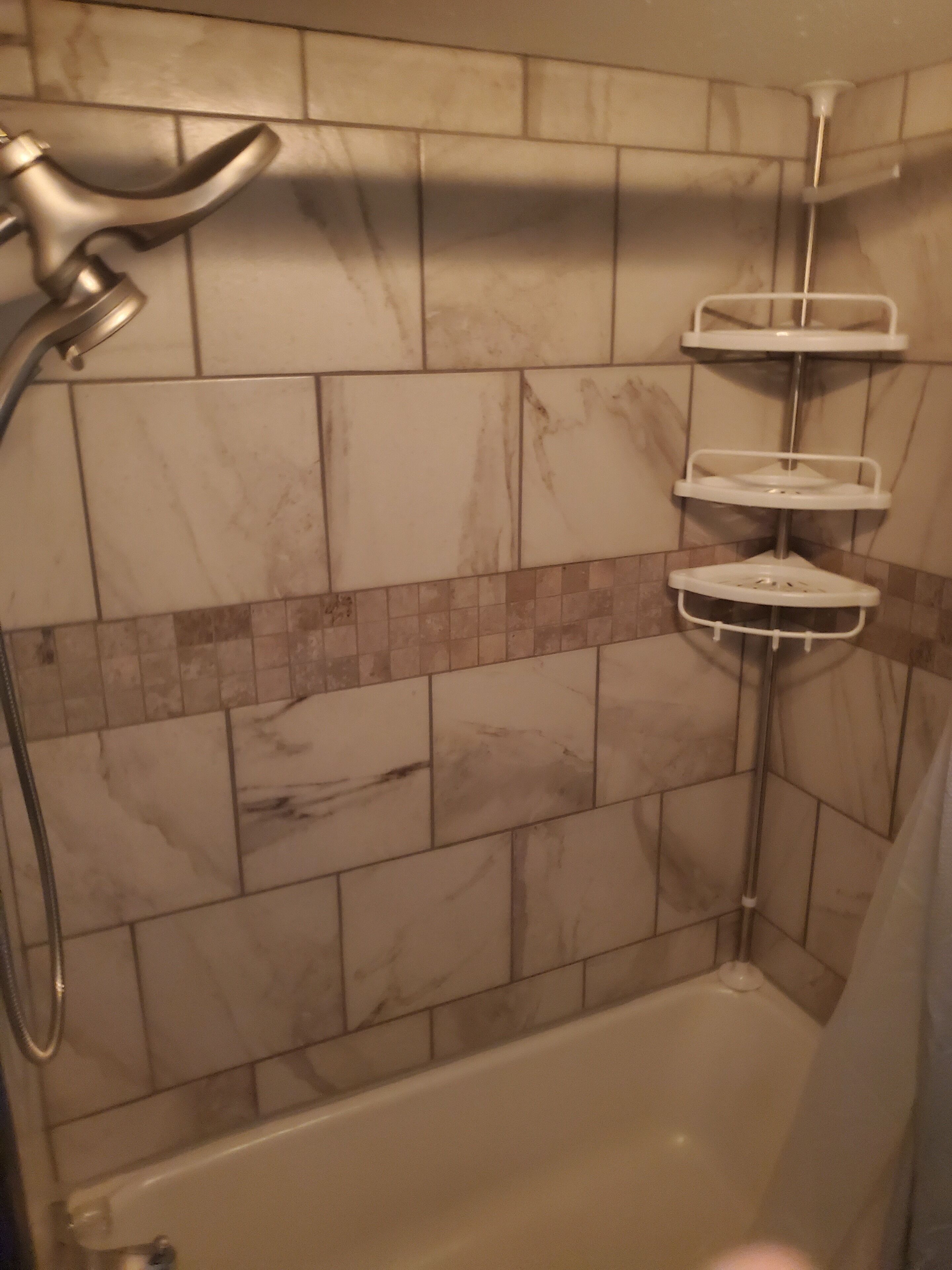 Combined shower/bathtub, hair dryer, towels, soap