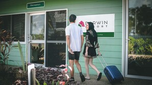 A reception area with a sign for 'Darwin Resort'. - Darwin Resort (Winnellie)