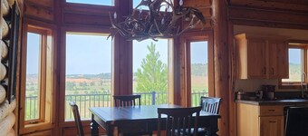 Large garage for bikes. Beautiful log home.  On golf course.