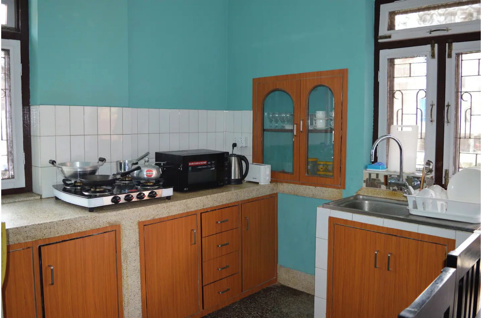 Fridge, microwave, electric kettle, cookware/dishes/utensils