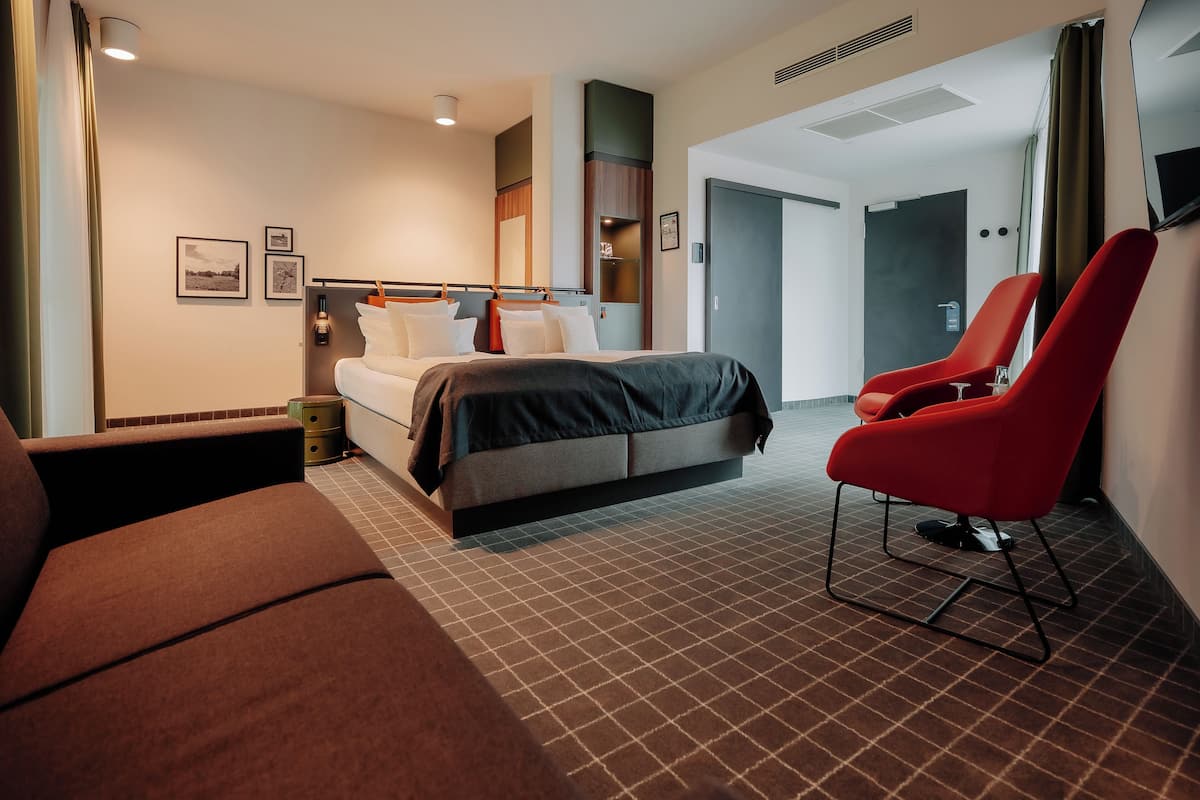 Habitación doble Deluxe | Ropa de cama de alta calidad y artículos del minibar gratis