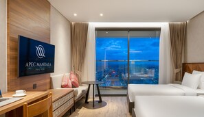 Luxe beddengoed, een minibar, een kluis op de kamer, een bureau
