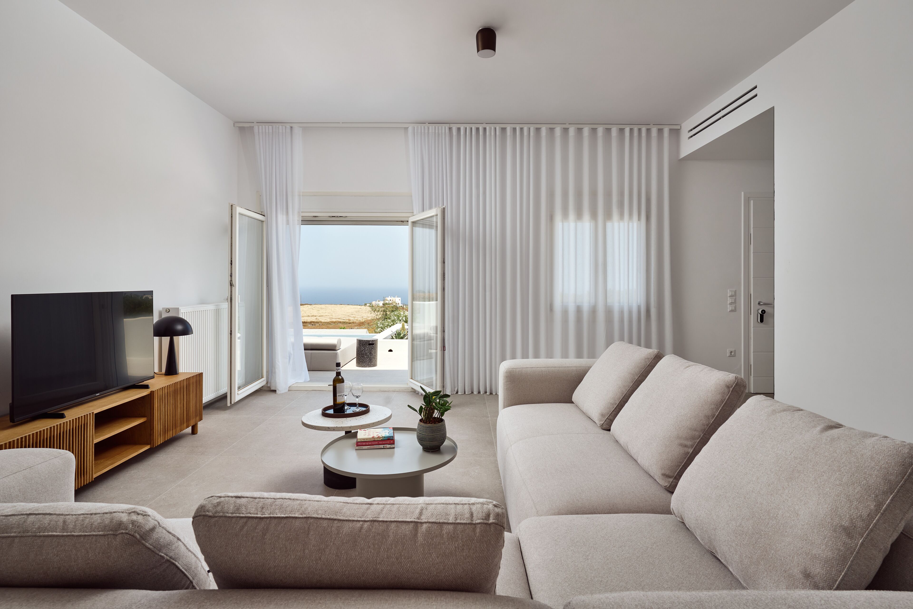 Exclusive Villa, Private Pool, Sea View | Living area | 50-inch Smart TV with satellite channels, TV