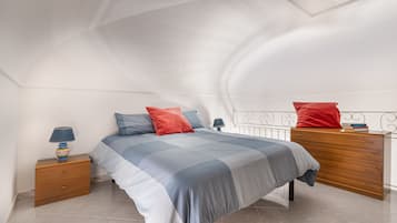 Down duvets, blackout curtains, iron/ironing board, travel cot