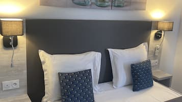 Habitación superior | Camas con efecto memoria y caja de seguridad en la habitación