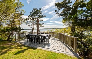 Outdoor dining - 2 Acre Waterfront Home Overlooking Waquoit Bay with Spa and Swim Dock (Falmouth)