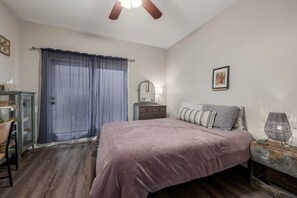 1 bedroom, desk, iron/ironing board, travel crib