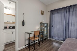 1 bedroom, desk, iron/ironing board, travel cot