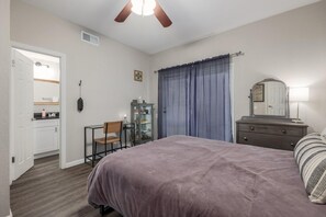 1 bedroom, desk, iron/ironing board, travel crib