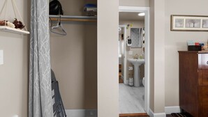 Une salle de bain moderne avec un lavabo blanc, un miroir et un porte-serviettes.