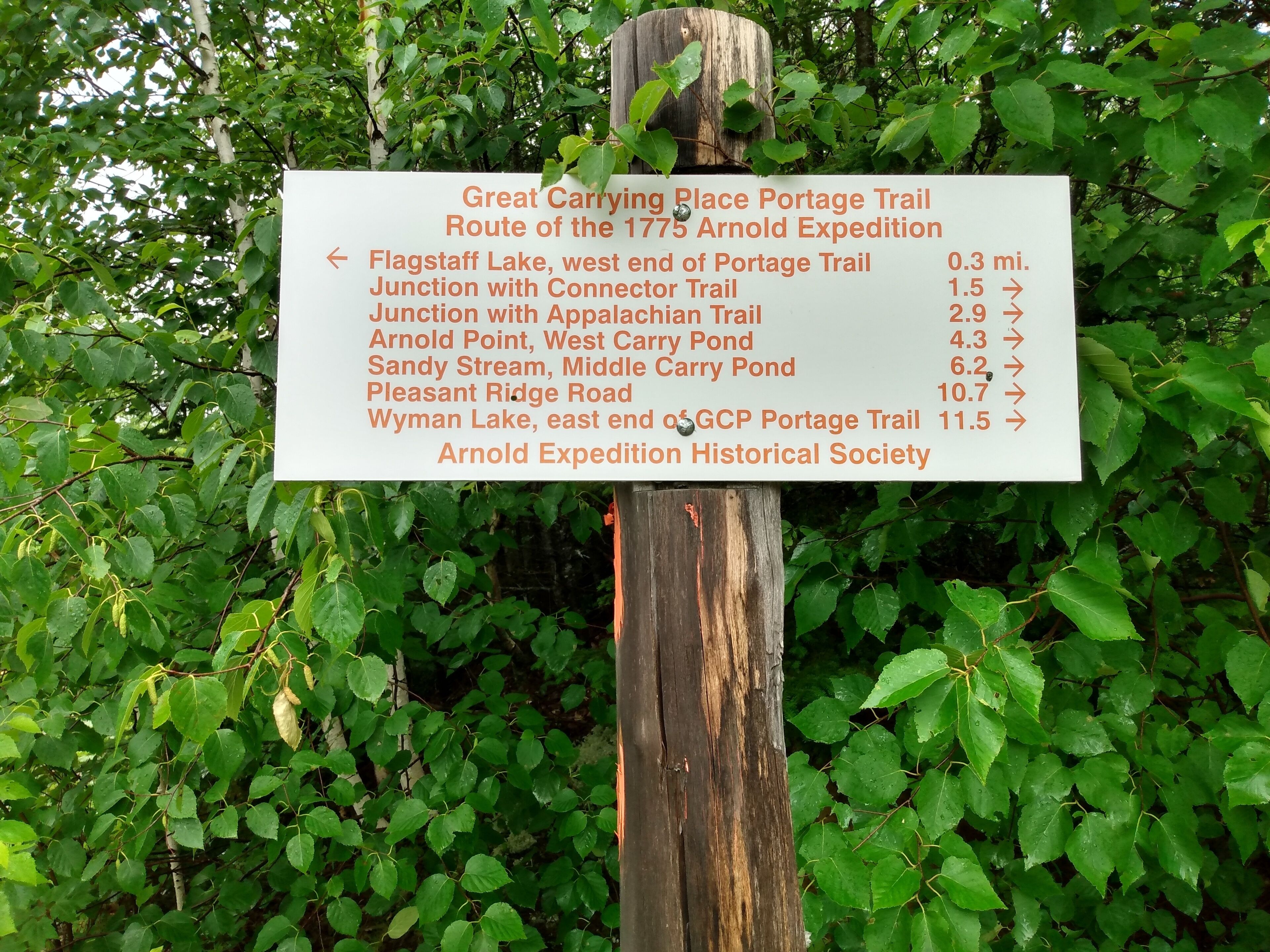 A signboard with trail information for the Great Carrying Place Portage Trail.