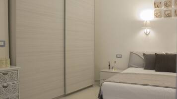 1 chambre, fer et planche Ă repasser, Wi-Fi gratuit, draps fournis