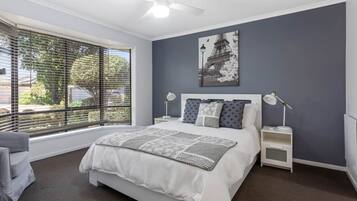 4 bedrooms, desk, iron/ironing board, travel cot