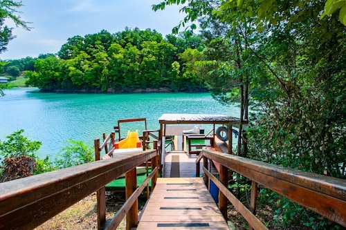 Bright Lake Cabin w/ Hot Tub, Rockers & Water Slide on Douglas Lake