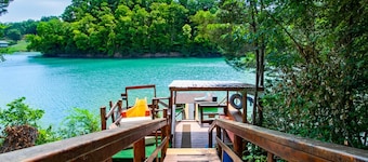 Bright Lake Cabin w/ Hot Tub, Rockers & Water Slide on Douglas Lake