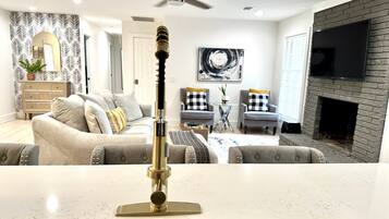 Smart TV, fireplace, books