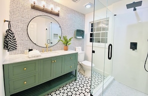 Shower, hair dryer, towels, soap