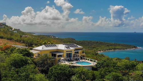 Home with panoramic views with access to private beach!