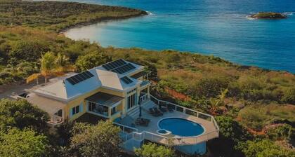Home with panoramic views with access to private beach!