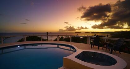 Home with panoramic views with access to private beach!