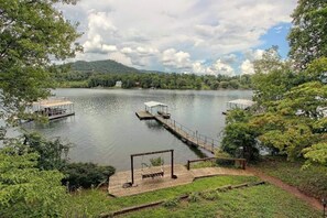 Property grounds - Twin Oaks Retreat by Chatuge Home Concierge | Lakefront w/ Pvt Covered Dock · Firepit · Ping Pong · Shuffleboard · Water Carpet (Hiawassee)
