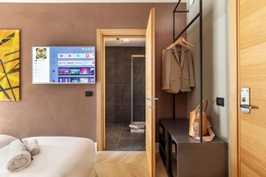 Couette en duvet d'oie, coffres-forts dans les chambres, bureau