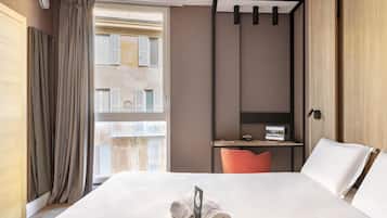 Economy Double Room, Non Smoking | Down comforters, in-room safe, desk, laptop workspace