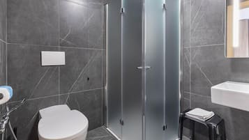 Shower, rainfall showerhead, bidet, towels