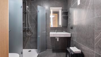 Shower, rainfall showerhead, bidet, towels