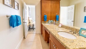 Combined shower/bathtub, hair dryer, towels, soap