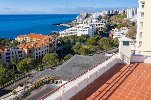 Experience the MEILA MADERA MARE hotel, set amidst a vibrant coastal urban area with ocean views.